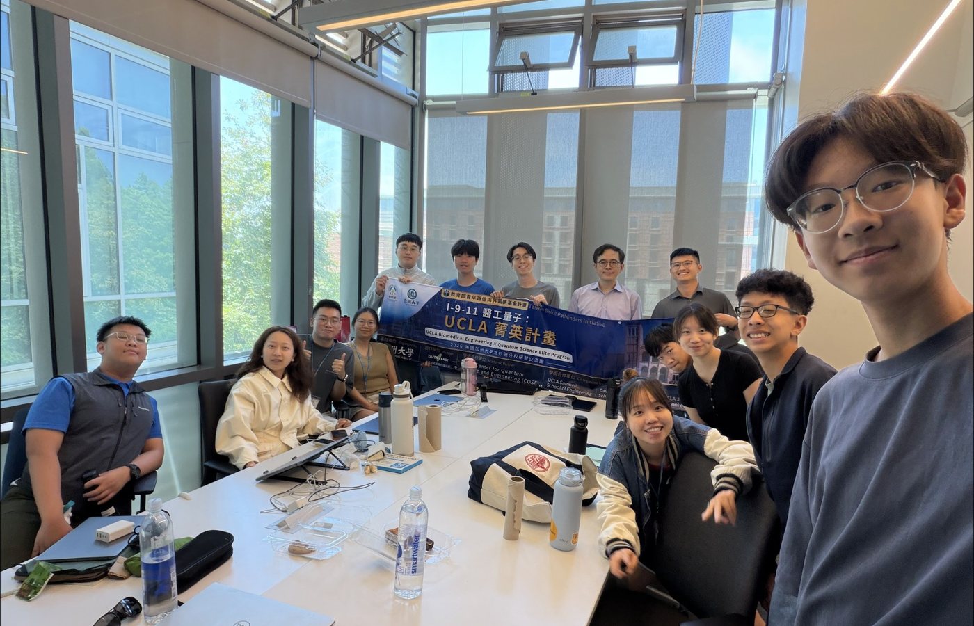 Dr. William Yu with participants and volunteers during class.