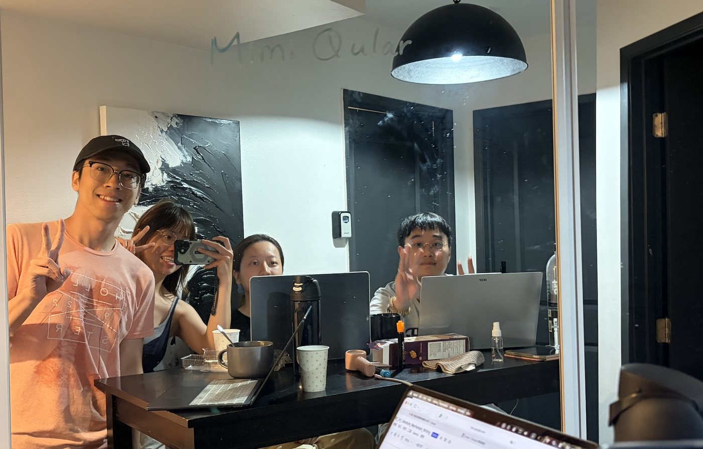 The MimiQular team discussing their research project proposal between classes